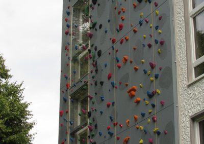A newly built climbing wall on a house facade