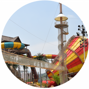 A ziplinetower with suspension bridge in an amusement park